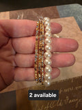Gold multi pearl stretch